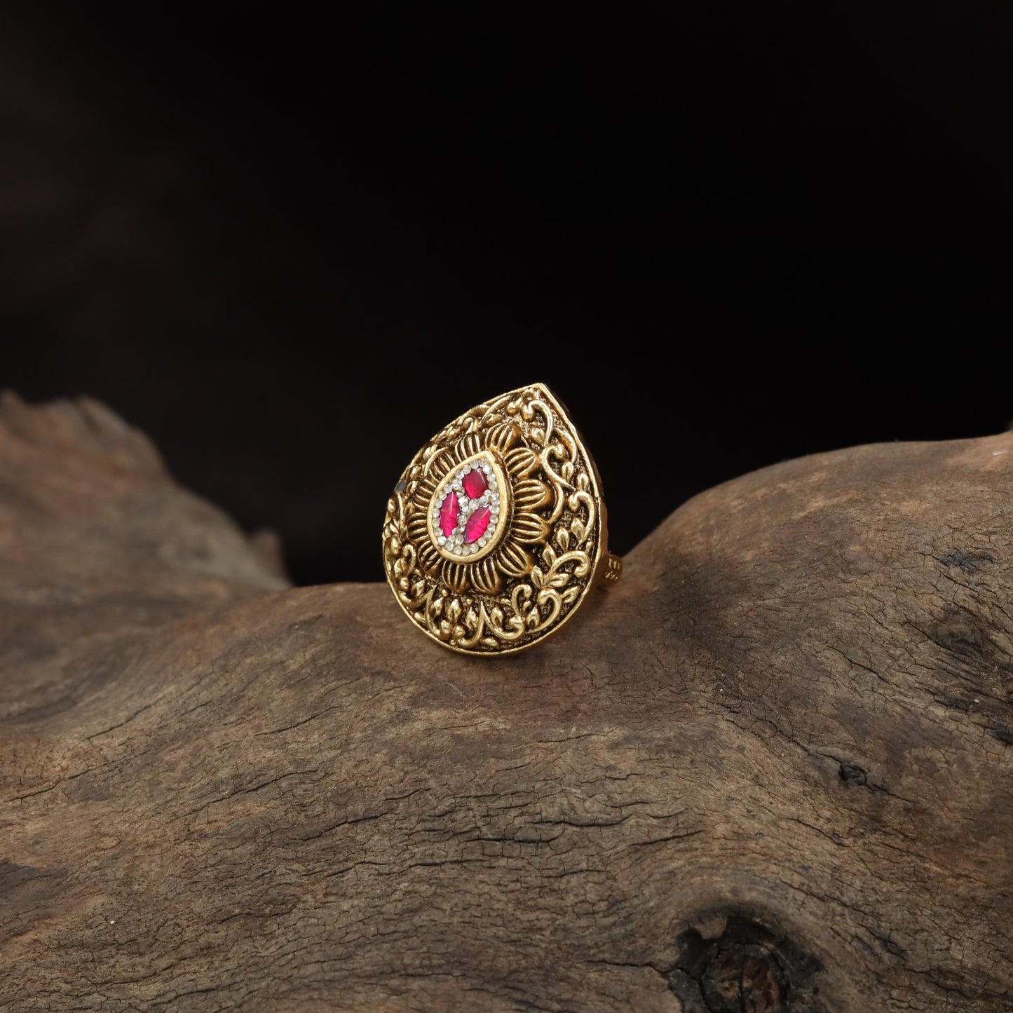 Traditional Antique Finger Ring with Radiating Lines and Elaborate Curved Detailing