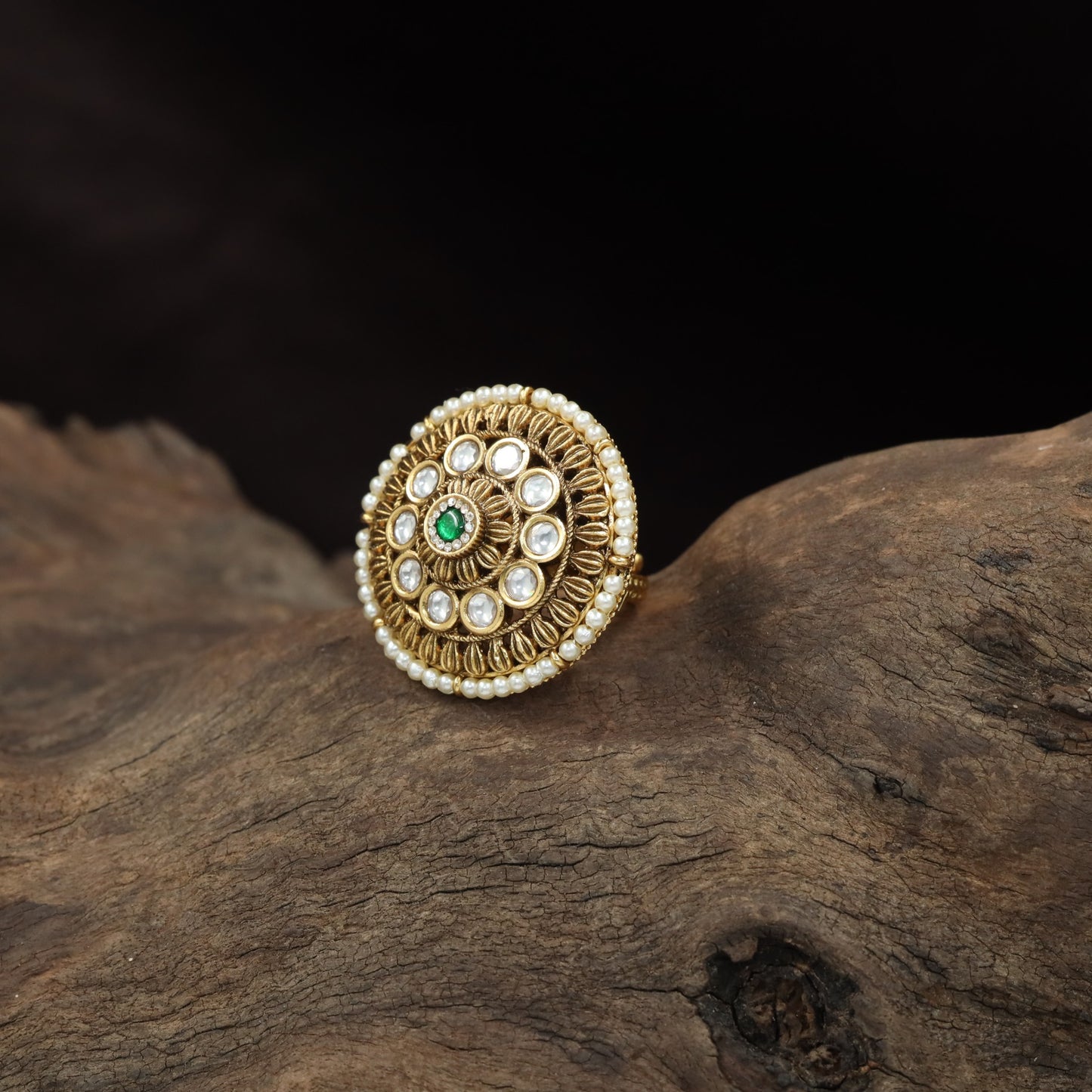 Traditional Antique Finger Ring with Sculpted Curves and Decorative Round Elements