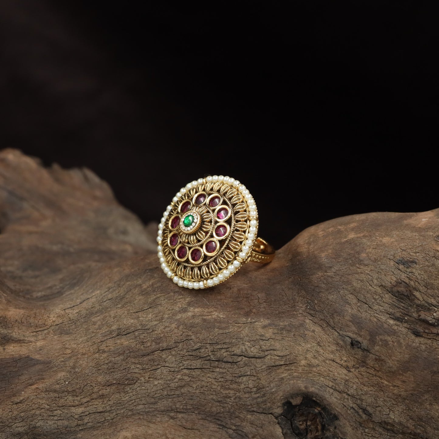 Traditional Antique Finger Ring with Sculpted Curves and Decorative Round Elements