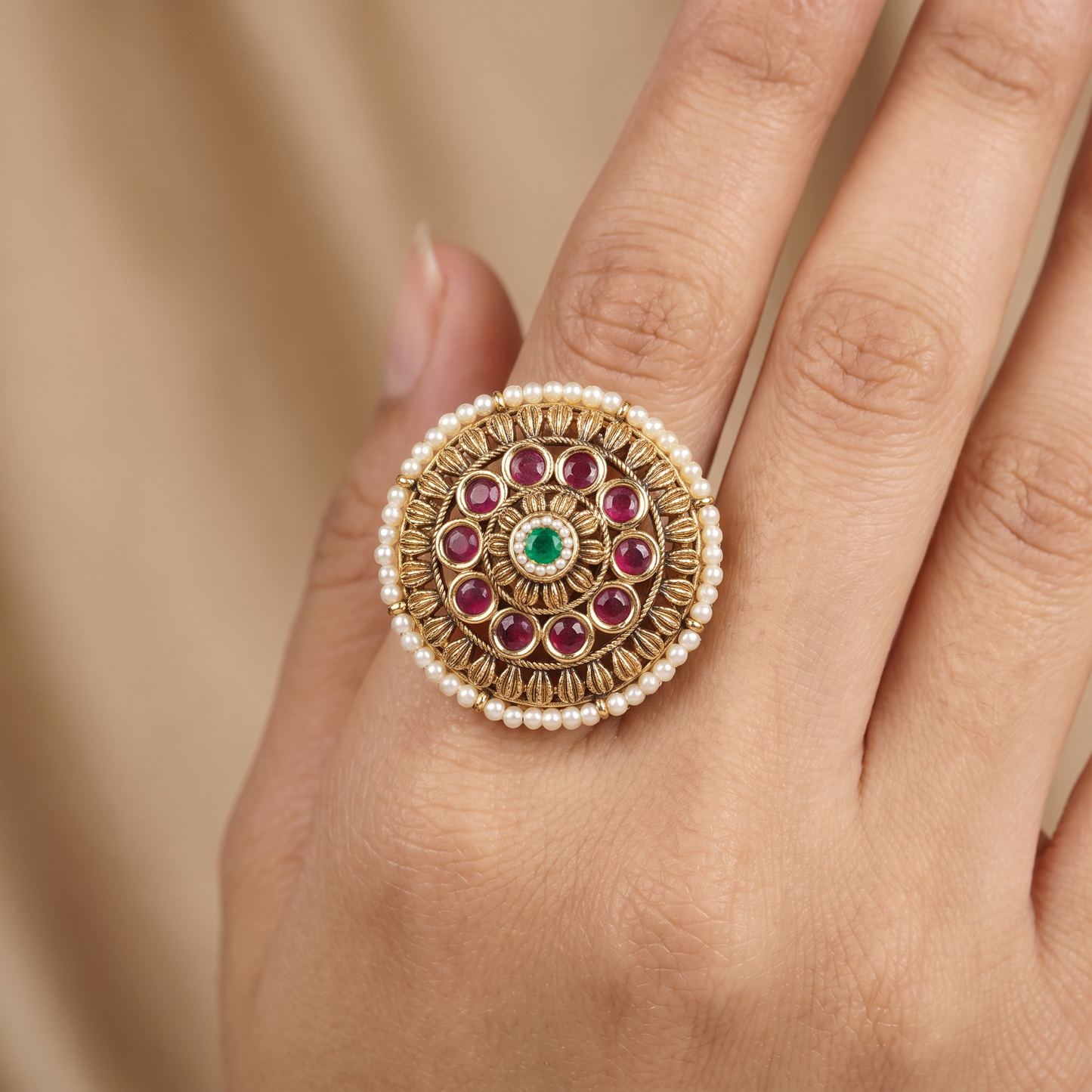 Traditional Antique Finger Ring with Sculpted Curves and Decorative Round Elements