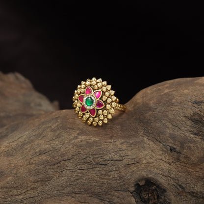 Antique Finger Ring Featuring a Symmetrical Flower Centre and Textured Petal Frame
