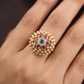 Antique Finger Ring Featuring a Symmetrical Flower Centre and Textured Petal Frame