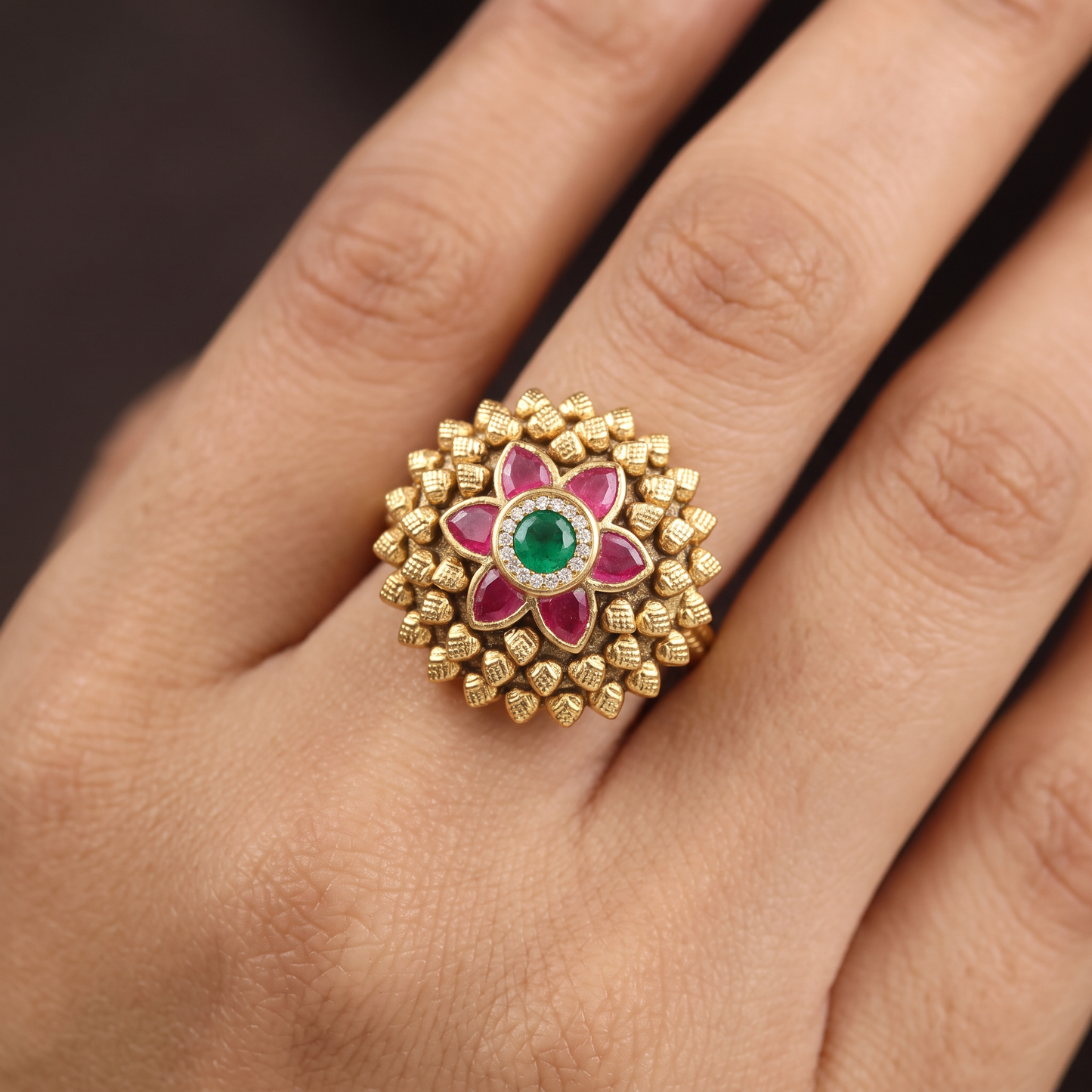 Antique Finger Ring Featuring a Symmetrical Flower Centre and Textured Petal Frame