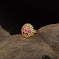 Antique Finger Ring Featuring a Symmetrical Flower Centre and Textured Petal Frame