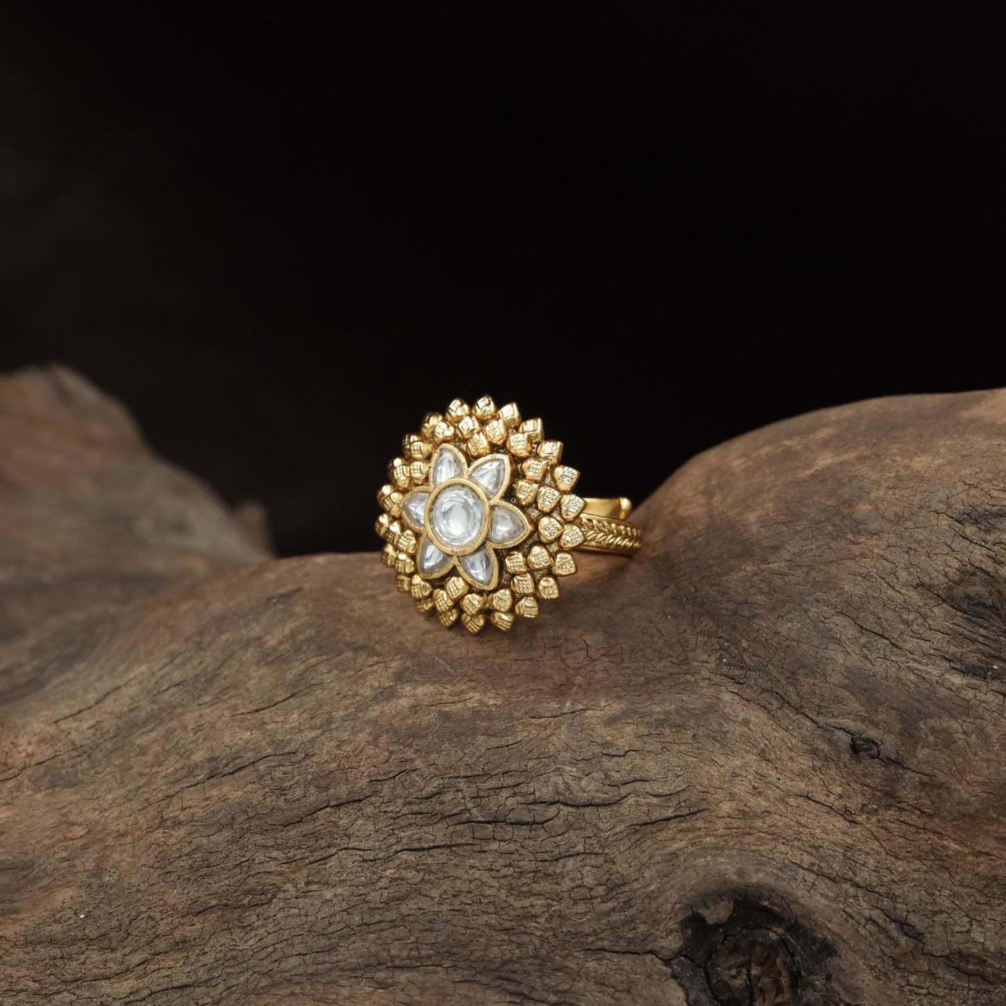 Antique Finger Ring with Ornamental Flower Design and Sculpted Petal Surround