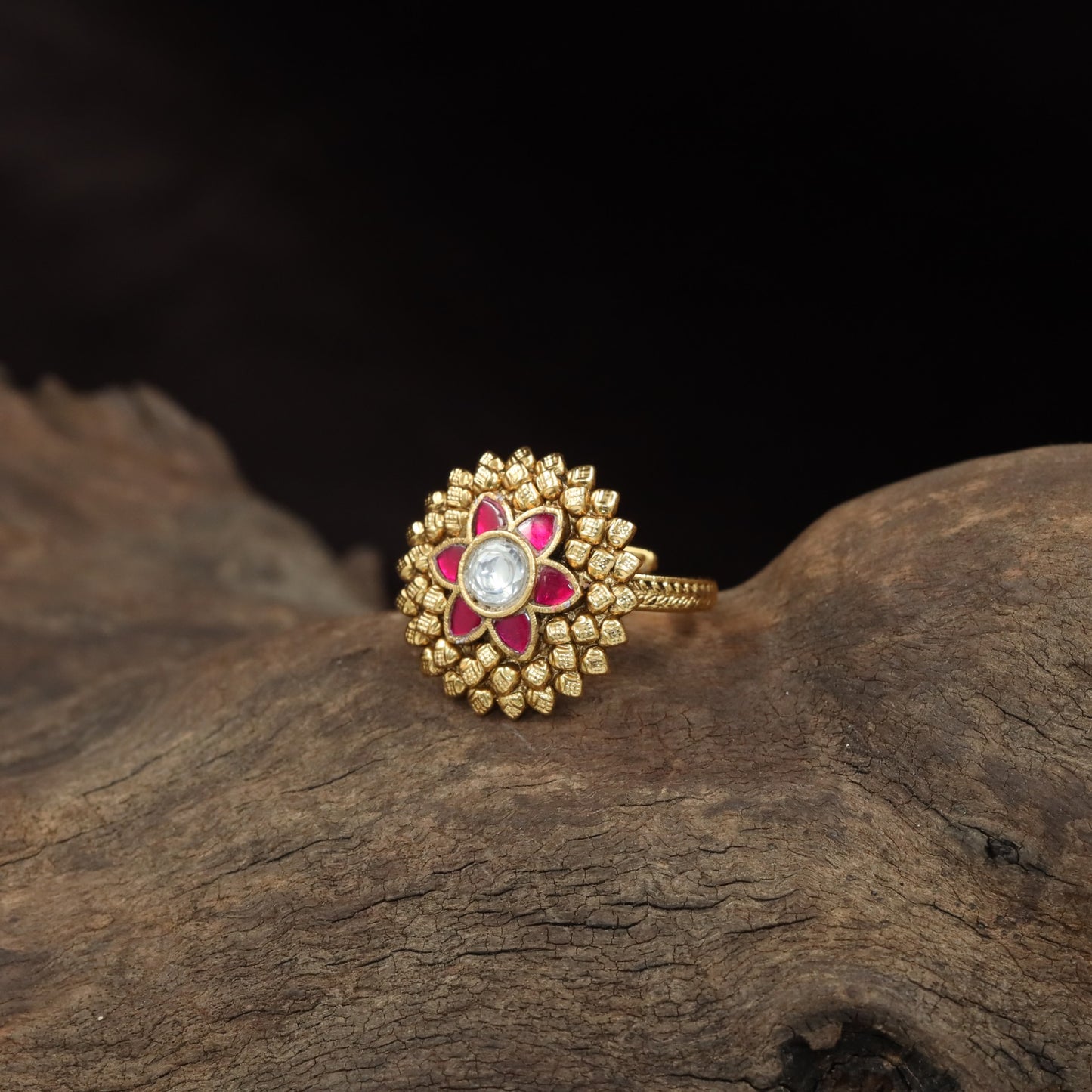 Antique Finger Ring with Ornamental Flower Design and Sculpted Petal Surround