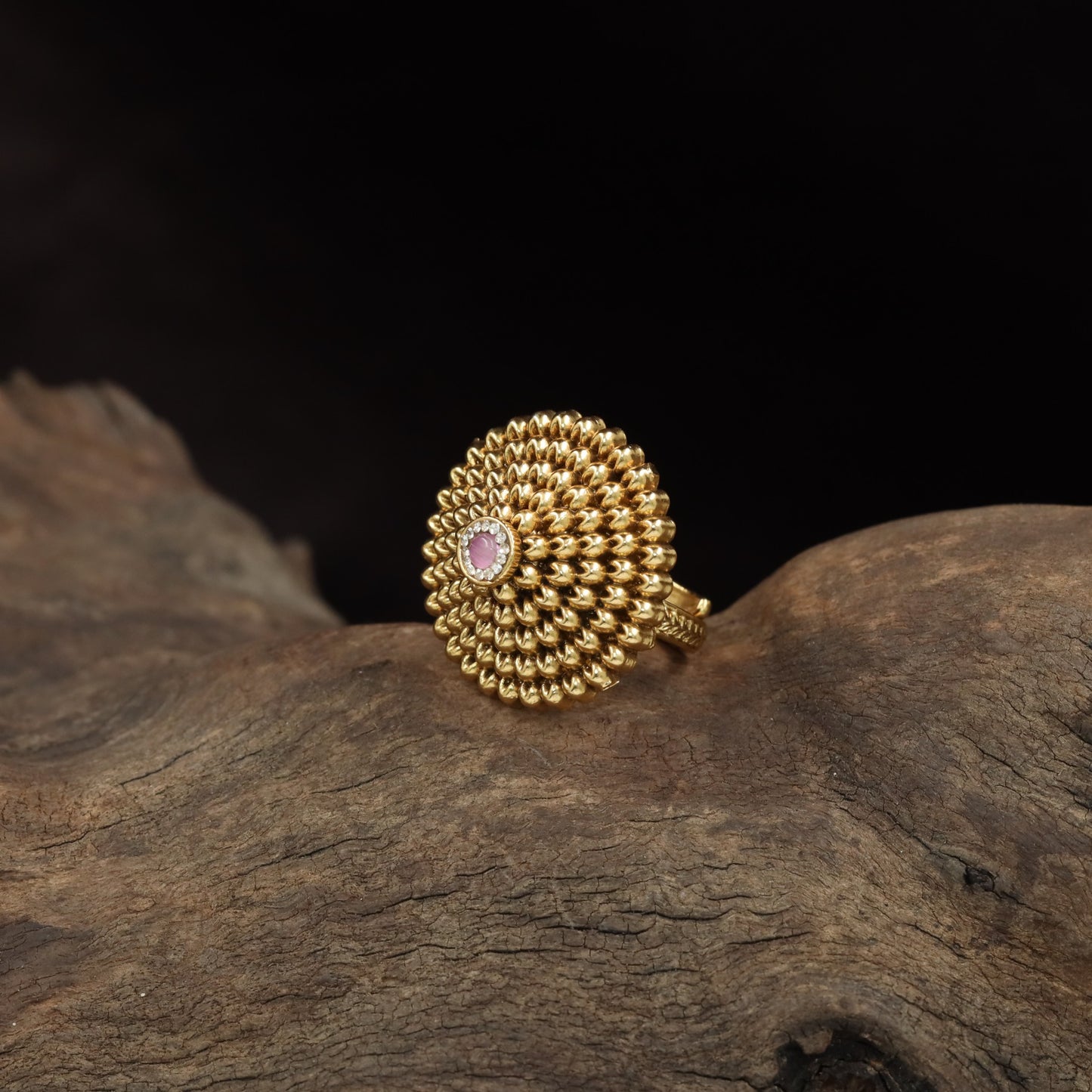 Antique Finger Ring Showcasing Repeating Beaded Elements in a Full Floral Design