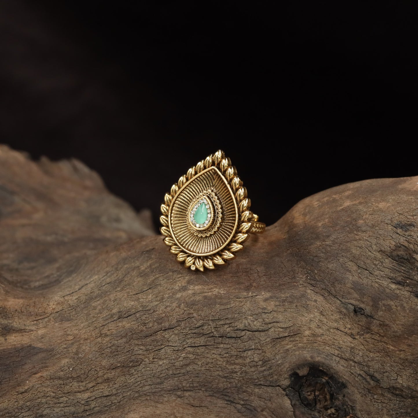 Teardrop Antique Finger Ring with Radiating Fanwork and Leaf Border