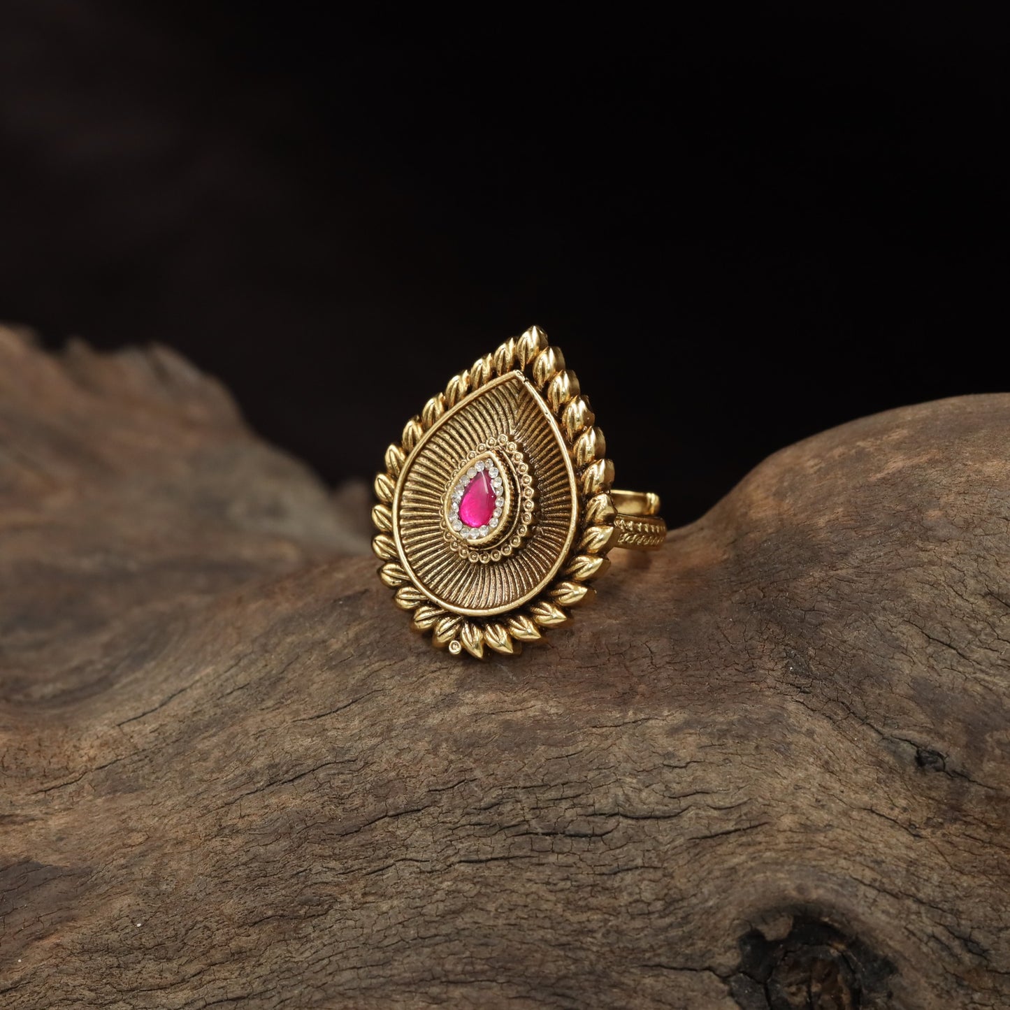 Teardrop Antique Finger Ring with Radiating Fanwork and Leaf Border