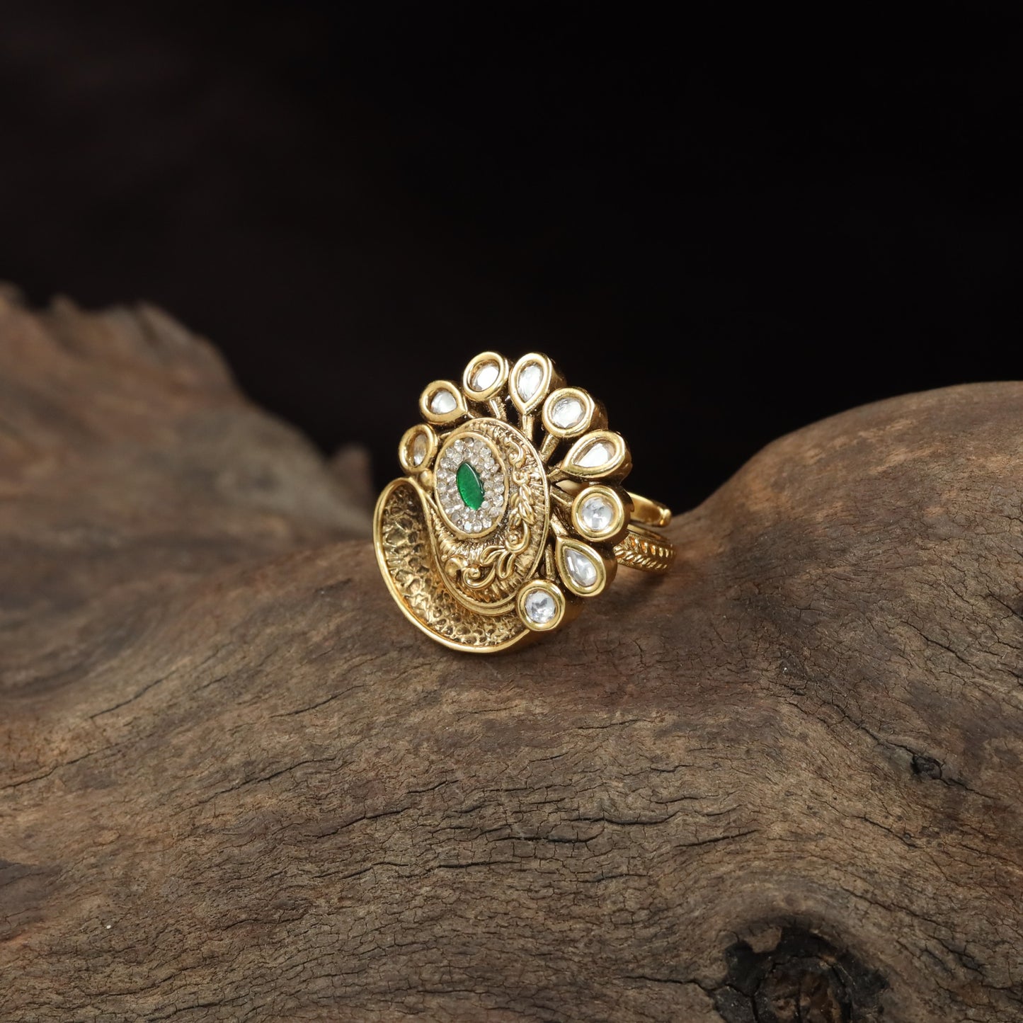 Antique Finger Ring with Teardrop Framing and Detailed Circular Medallion Work