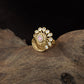 Antique Finger Ring with Teardrop Framing and Detailed Circular Medallion Work