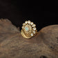 Antique Finger Ring with Teardrop Framing and Detailed Circular Medallion Work