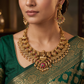 Antique Necklace with Detailed Lakshmi Centre and Decorative Hanging Elements