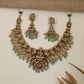 Antique Necklace with Detailed Lakshmi Centre and Decorative Hanging Elements