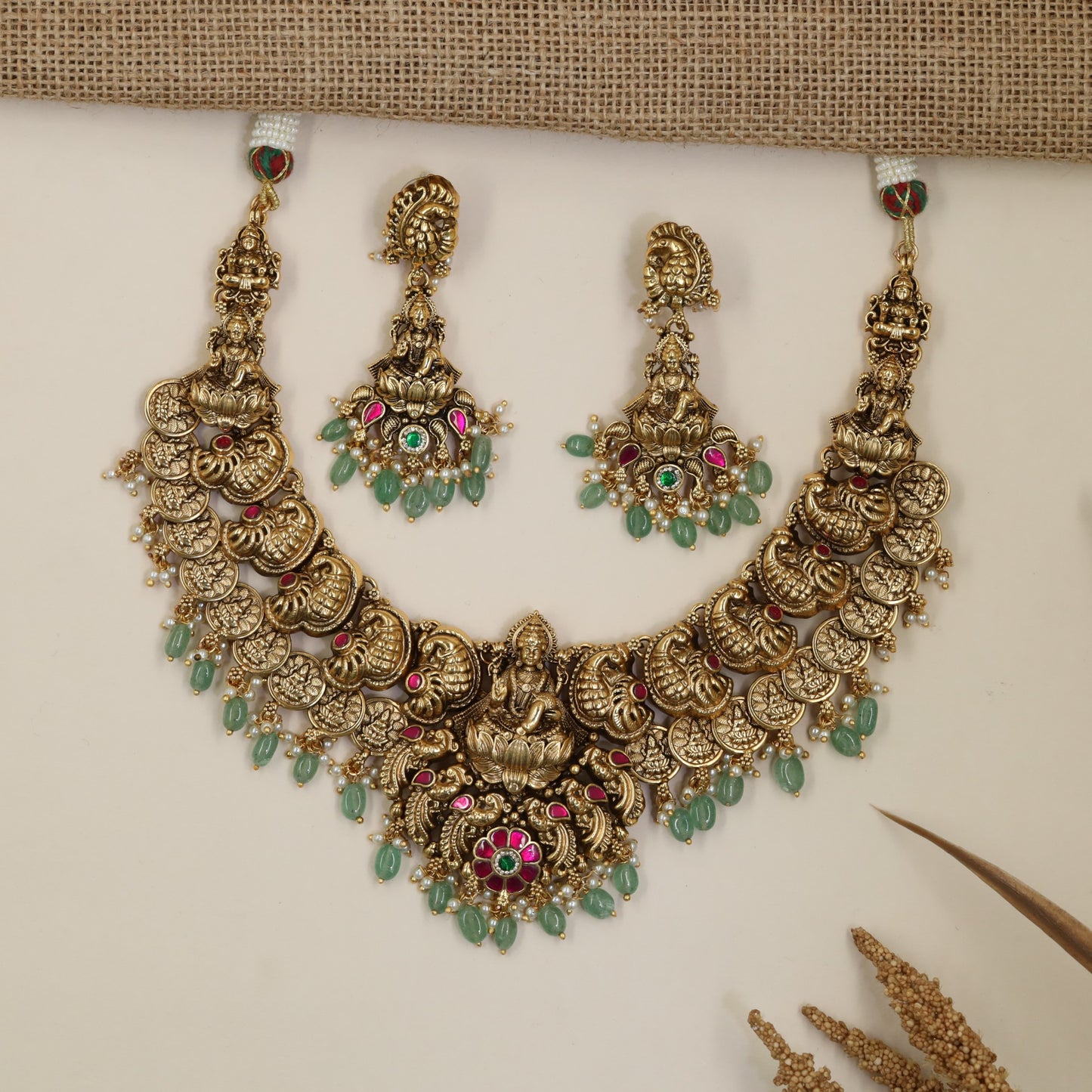 Antique Necklace with Detailed Lakshmi Centre and Decorative Hanging Elements