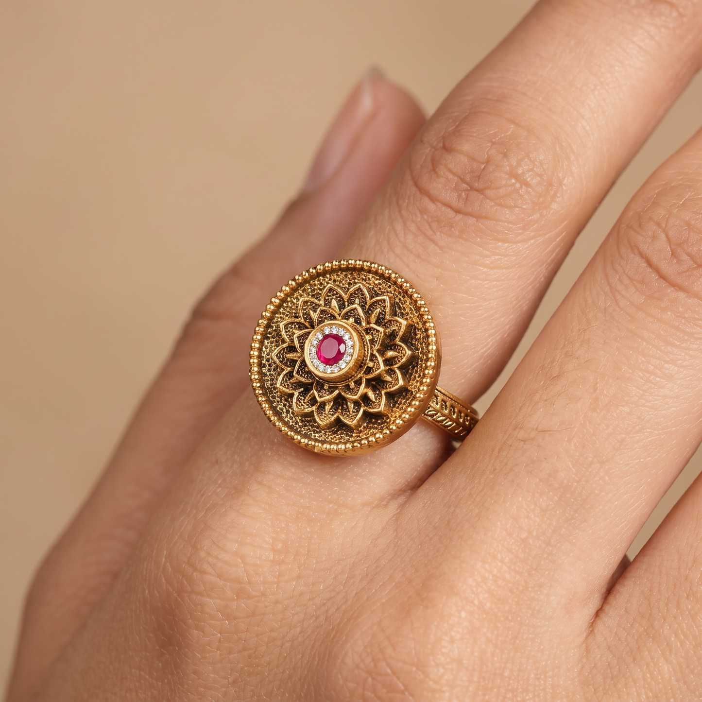 Antique Finger Ring with Detailed Rosette Centre and Textured Outer Frame