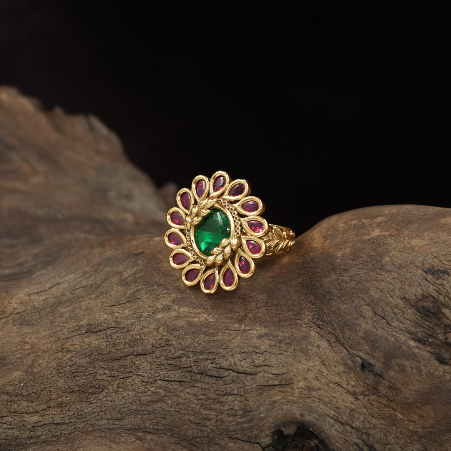 Antique Finger Ring with Symmetrical Petal Arrangement and Textured Band