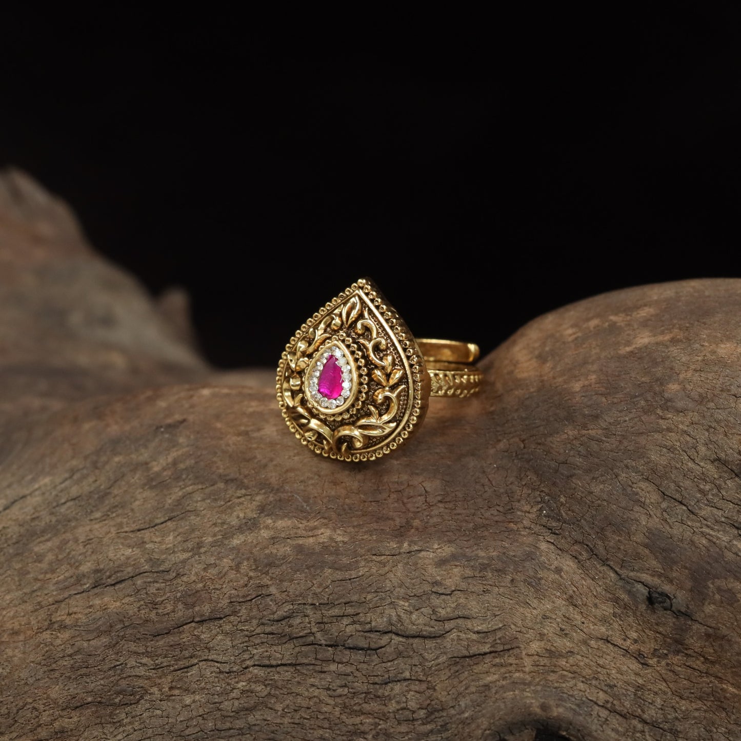 Teardrop Antique Finger Ring with Intricate Floral Scrollwork and Ornate Border