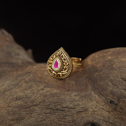 Teardrop Antique Finger Ring with Intricate Floral Scrollwork and Ornate Border