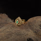 Teardrop Antique Finger Ring with Intricate Floral Scrollwork and Ornate Border