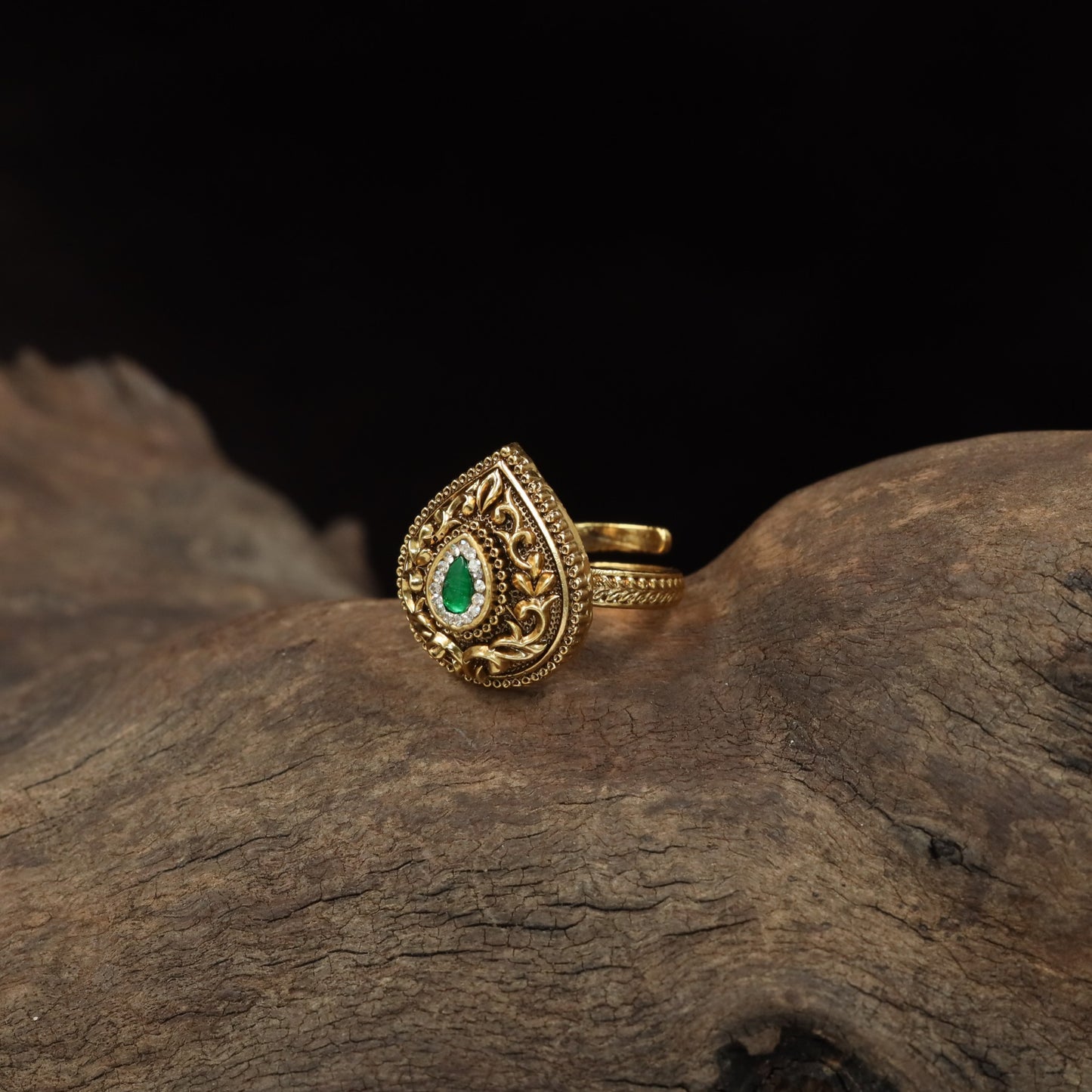 Teardrop Antique Finger Ring with Intricate Floral Scrollwork and Ornate Border