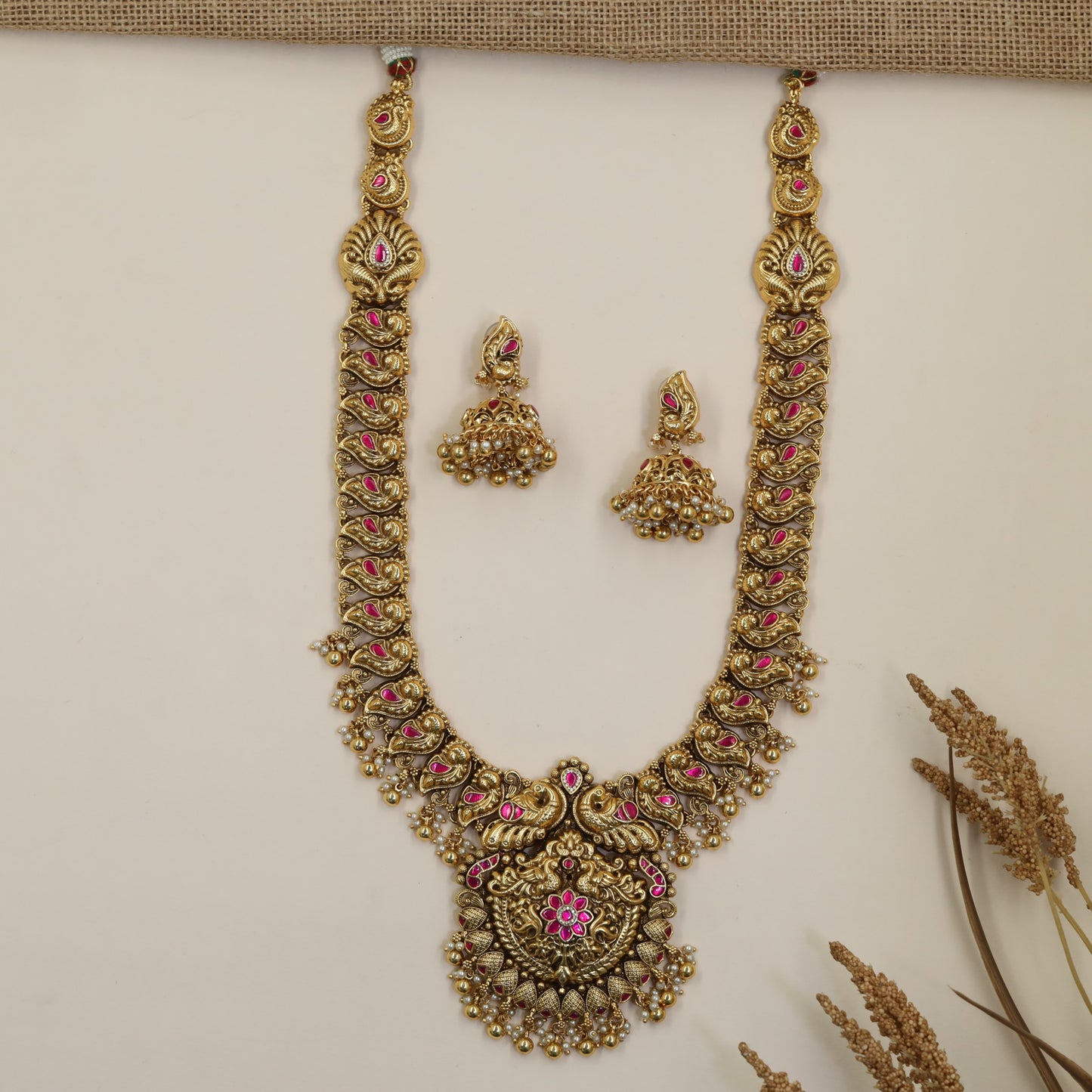 Peacock Long Haara with Intricate Curved Work and Ornamental Pendant