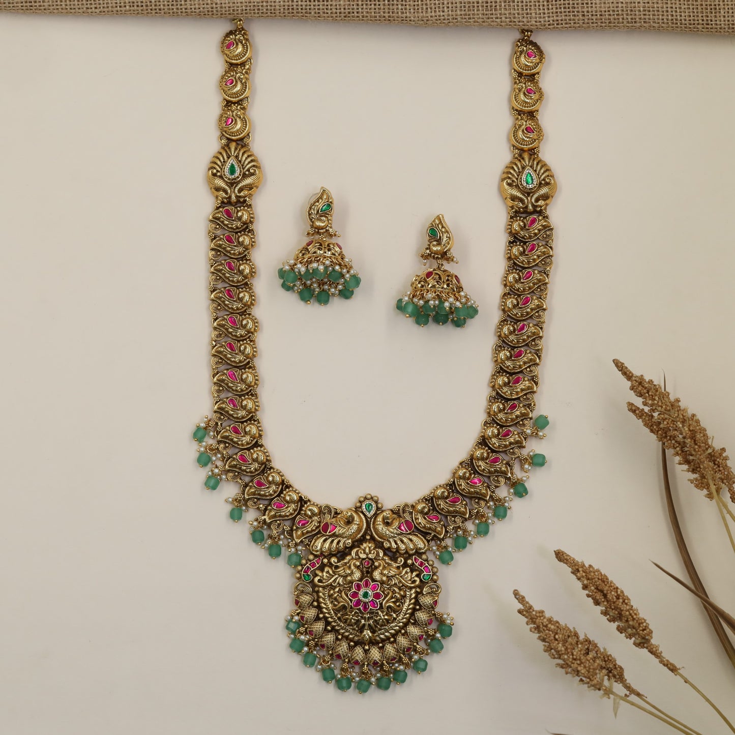 Peacock Long Haara with Intricate Curved Work and Ornamental Pendant
