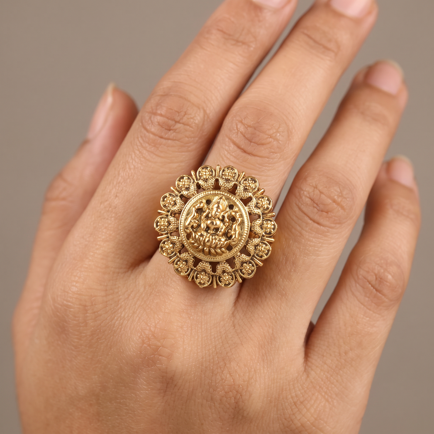 Lakshmi Antique Finger Ring with Ornate Medallion and Floral Border