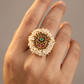 Antique Finger Ring Featuring a Sculpted Floral Centre and Pearl Fringe