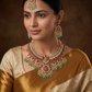 Classic royal Jadau collar necklace featuring crescent moon drops and pearl clusters