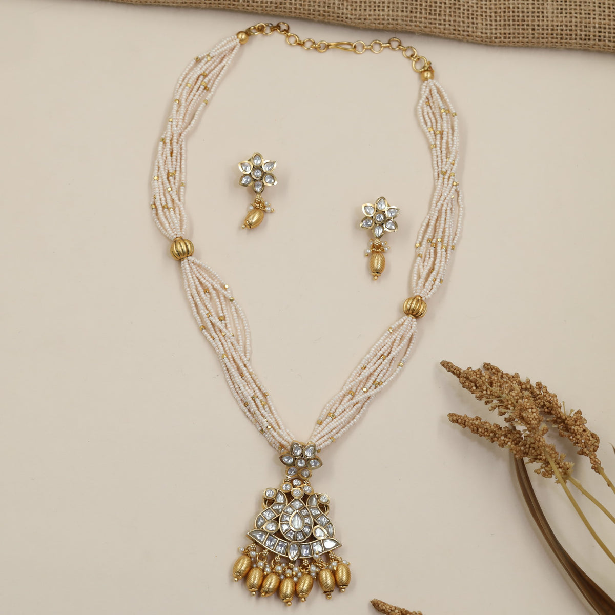 Kundan Pearl Beads Necklace Set with Floral Crest