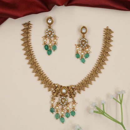 Festive Jadau Necklace with Intricate Leaf Panels