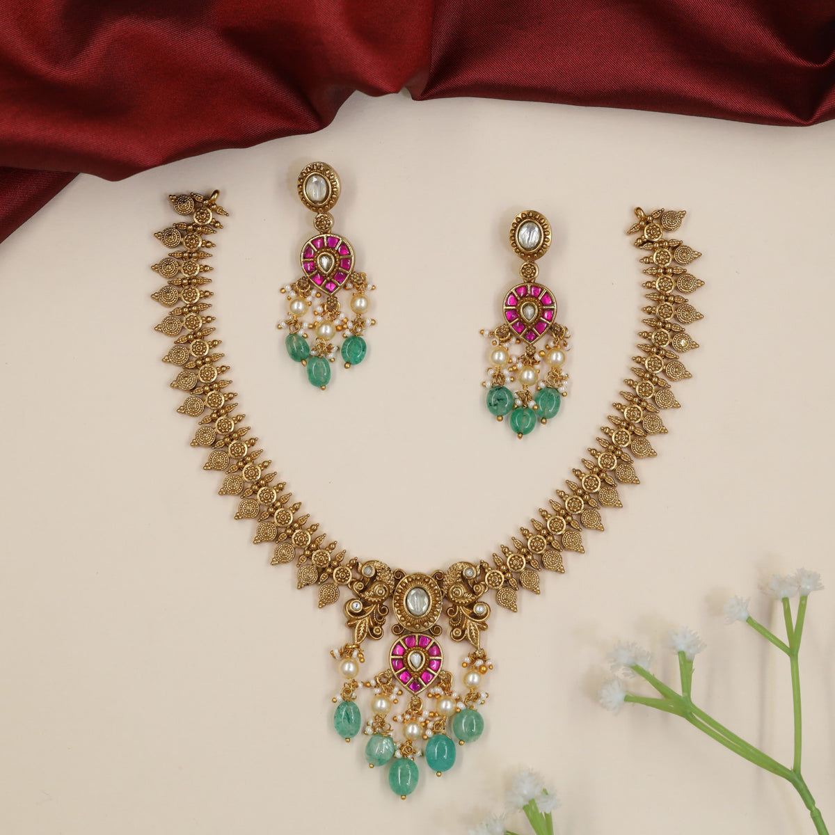 Festive Jadau Necklace with Intricate Leaf Panels