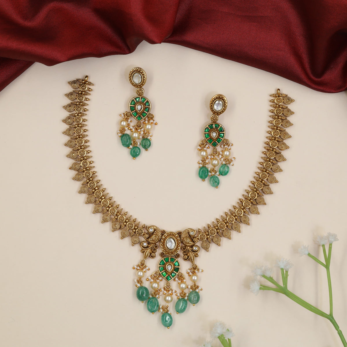 Festive Jadau Necklace with Intricate Leaf Panels