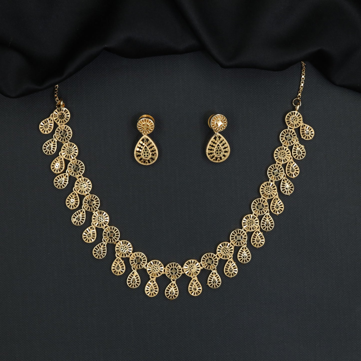 Forming Necklace with Floral Roundels and Teardrop Filigree Drops