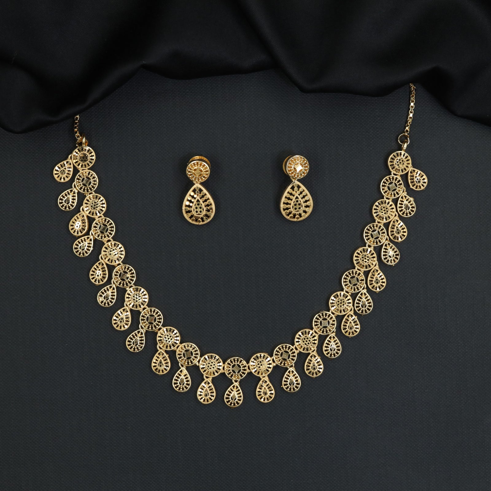 Forming Necklace with Floral Roundels and Teardrop Filigree Drops