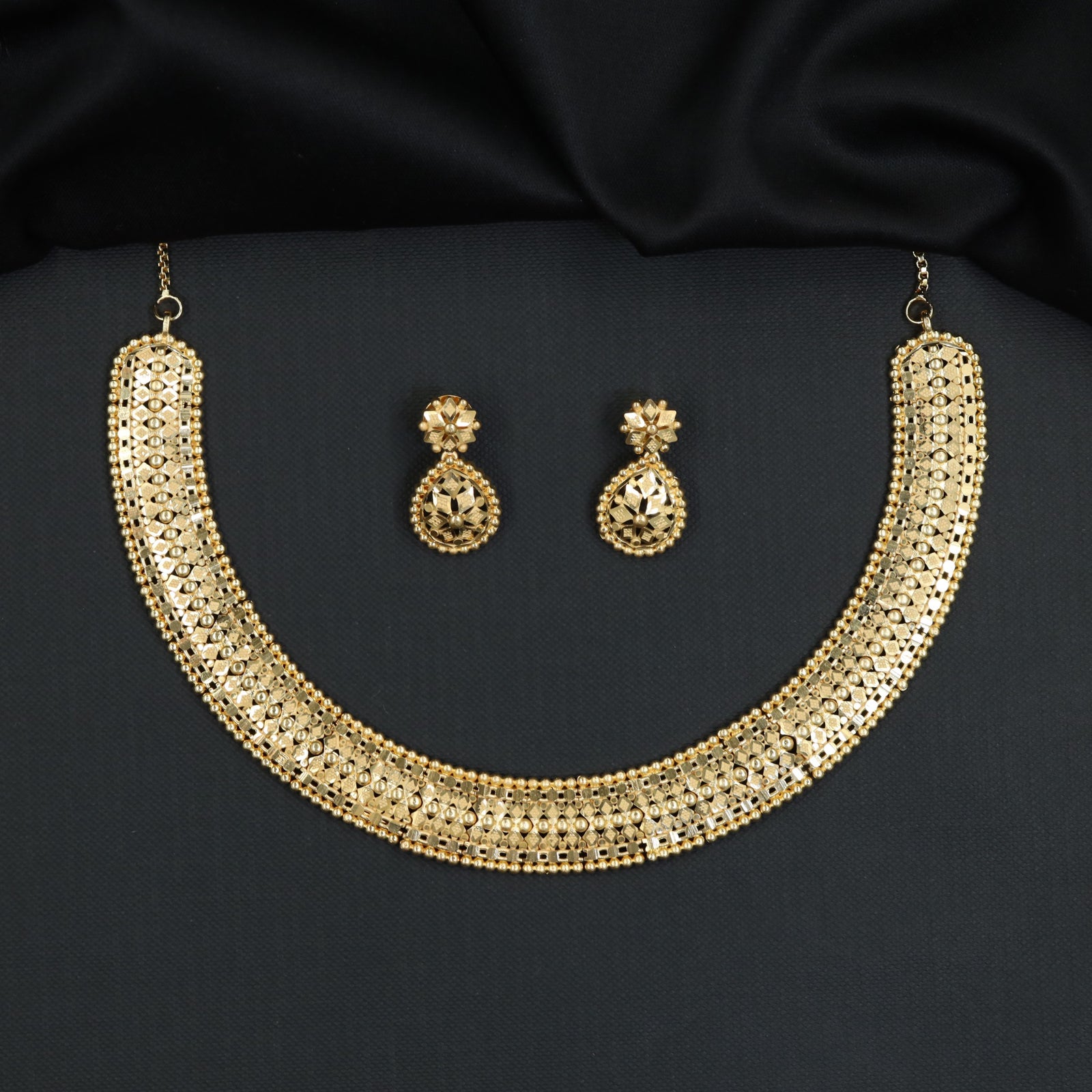 Forming Necklace with Broad Geometric Openwork