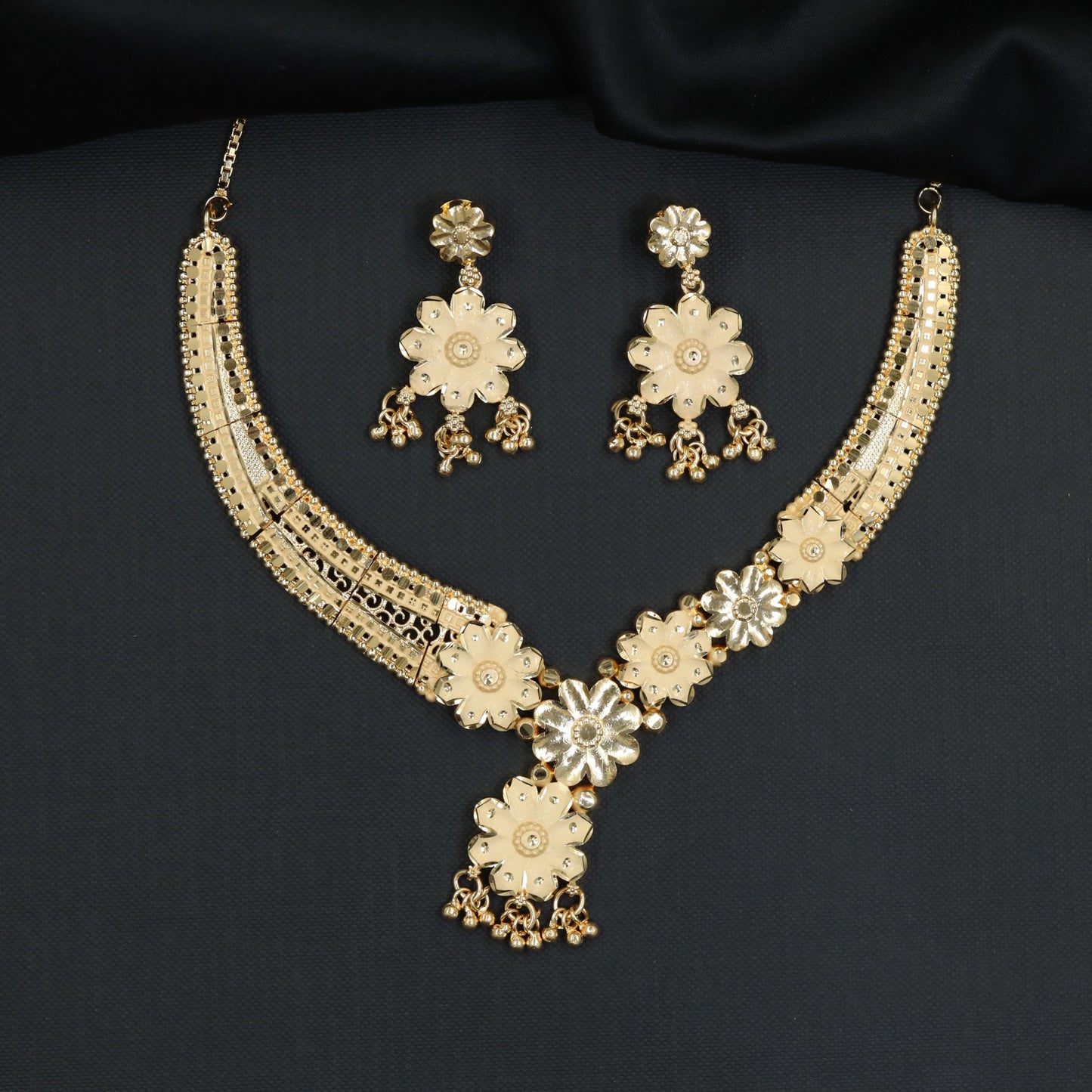Forming Necklace with V-collar blossom link trail and cascading flower drop