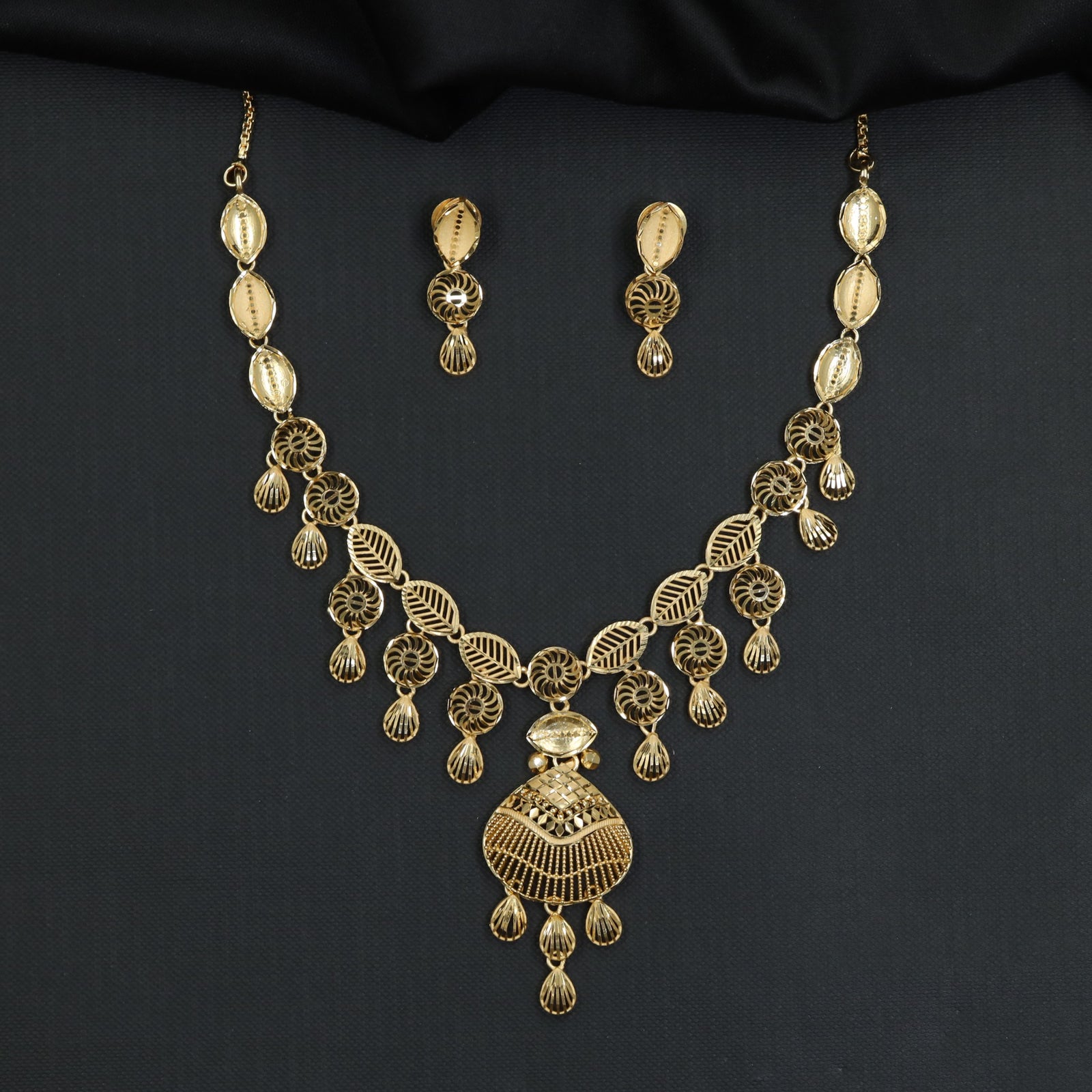 Vintage inspired openwork Forming Necklace with swaying charm drops