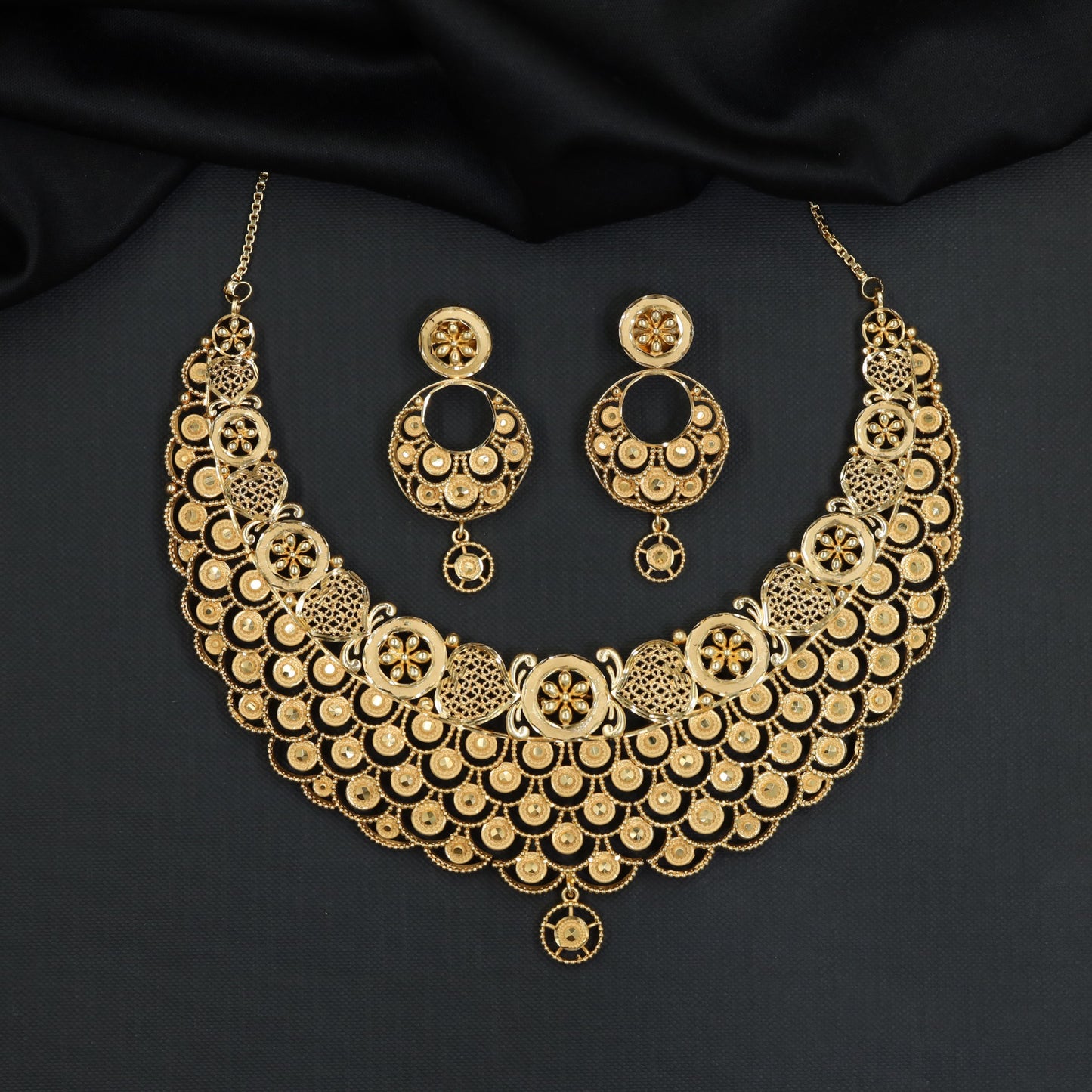 Royal wedding Forming Necklace featuring layered openwork disc motifs