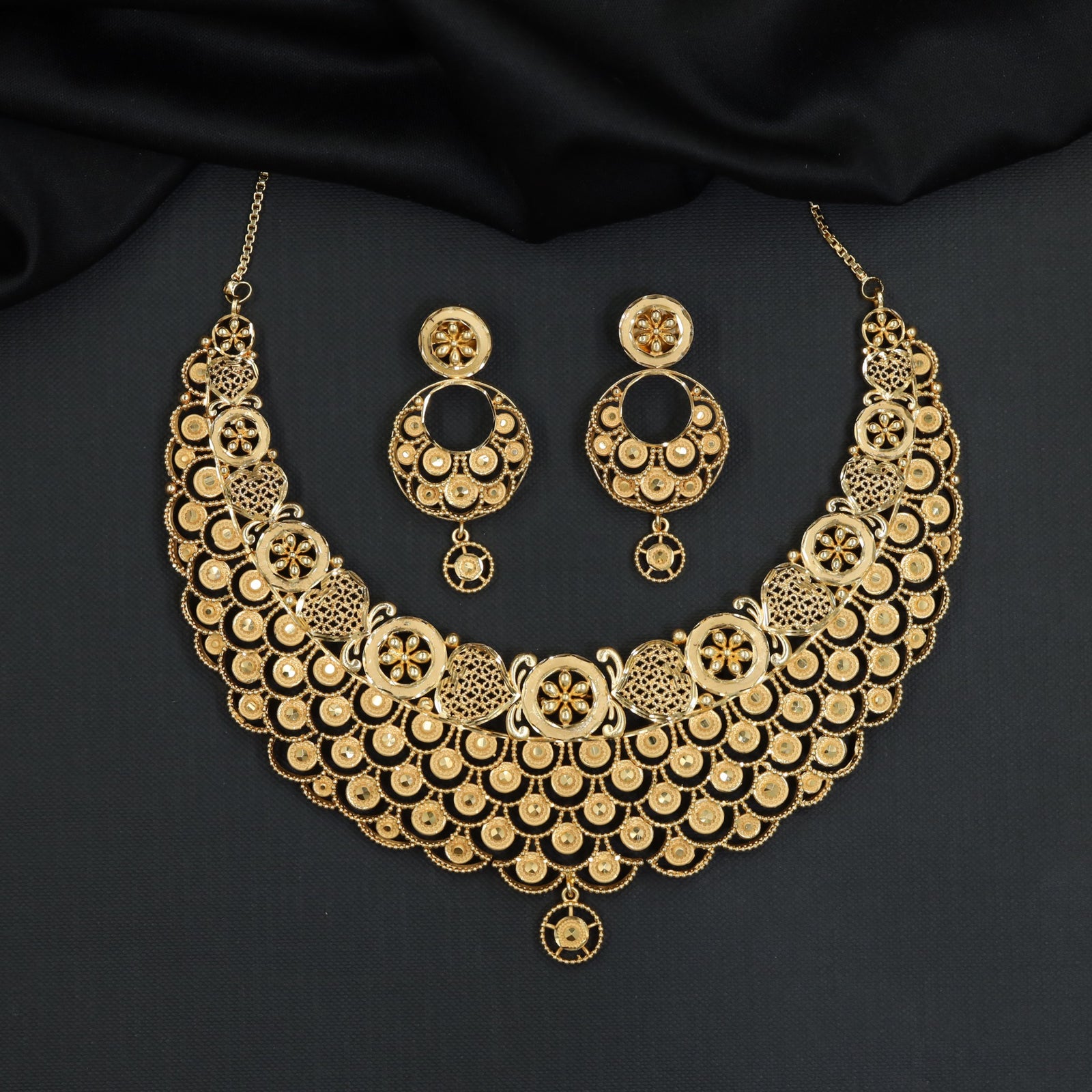 Royal wedding Forming Necklace featuring layered openwork disc motifs