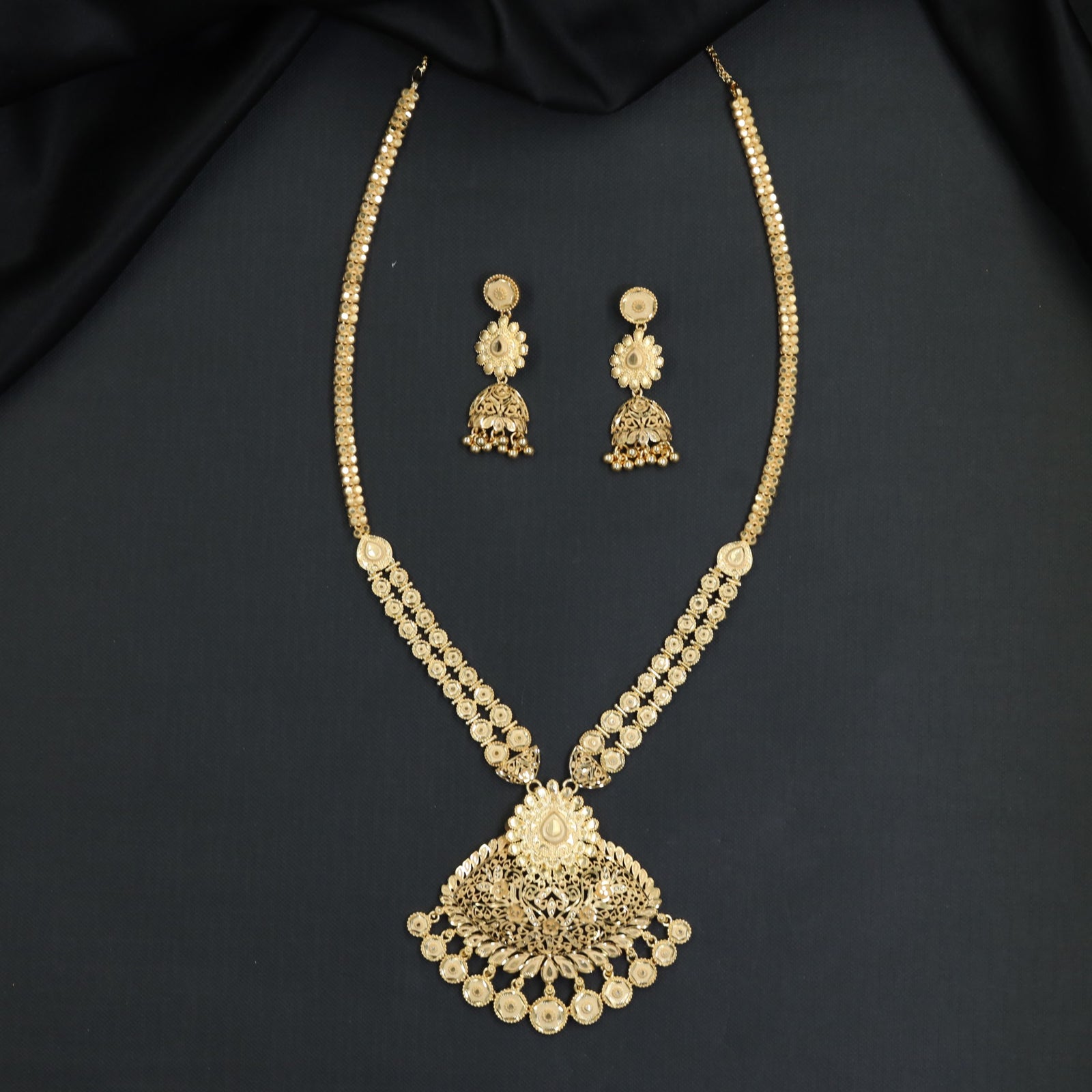 Heritage Long Haara with delicate beadwork strands and a scalloped coin border