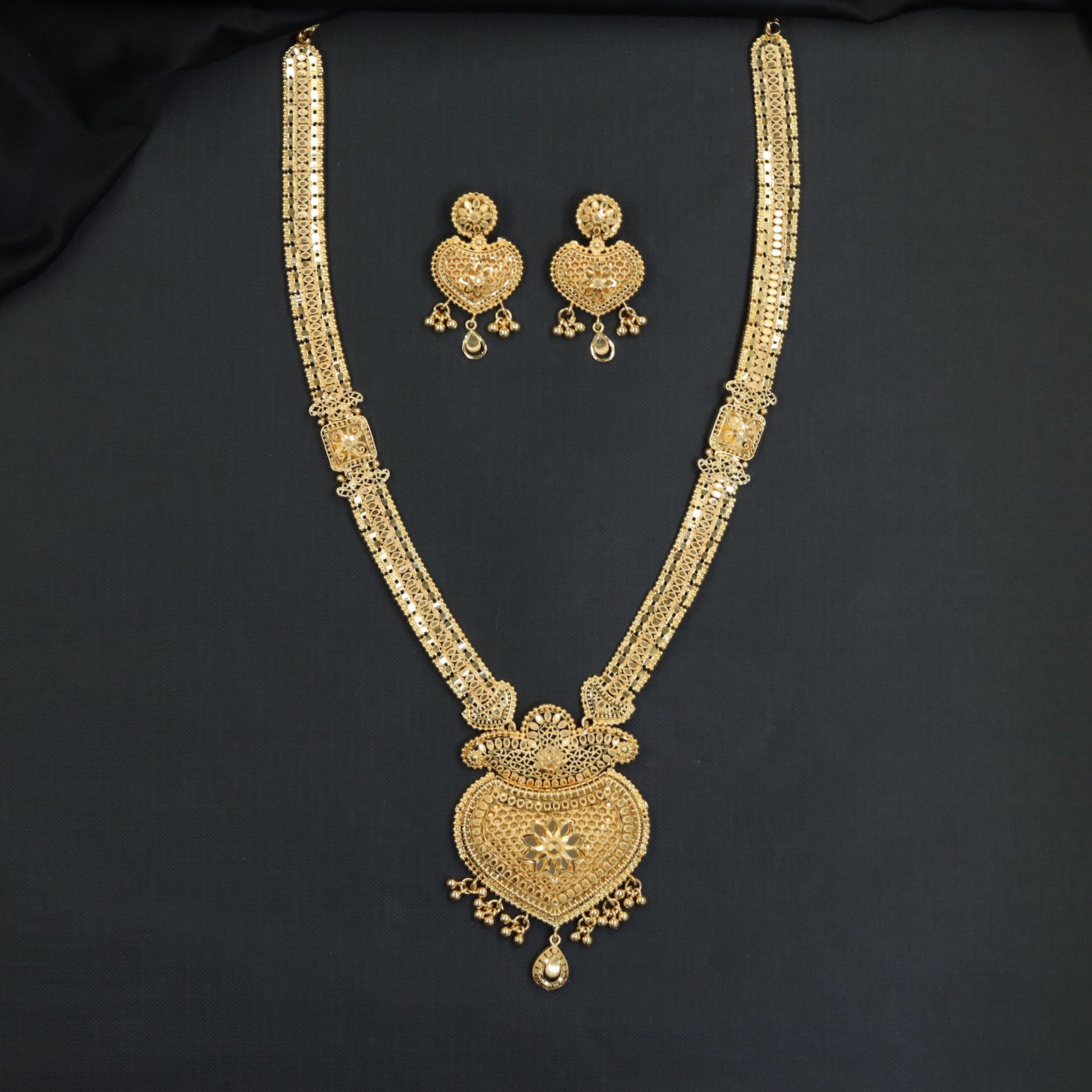 Classic Openwork Forming Long Haara with Floral Centre Detail