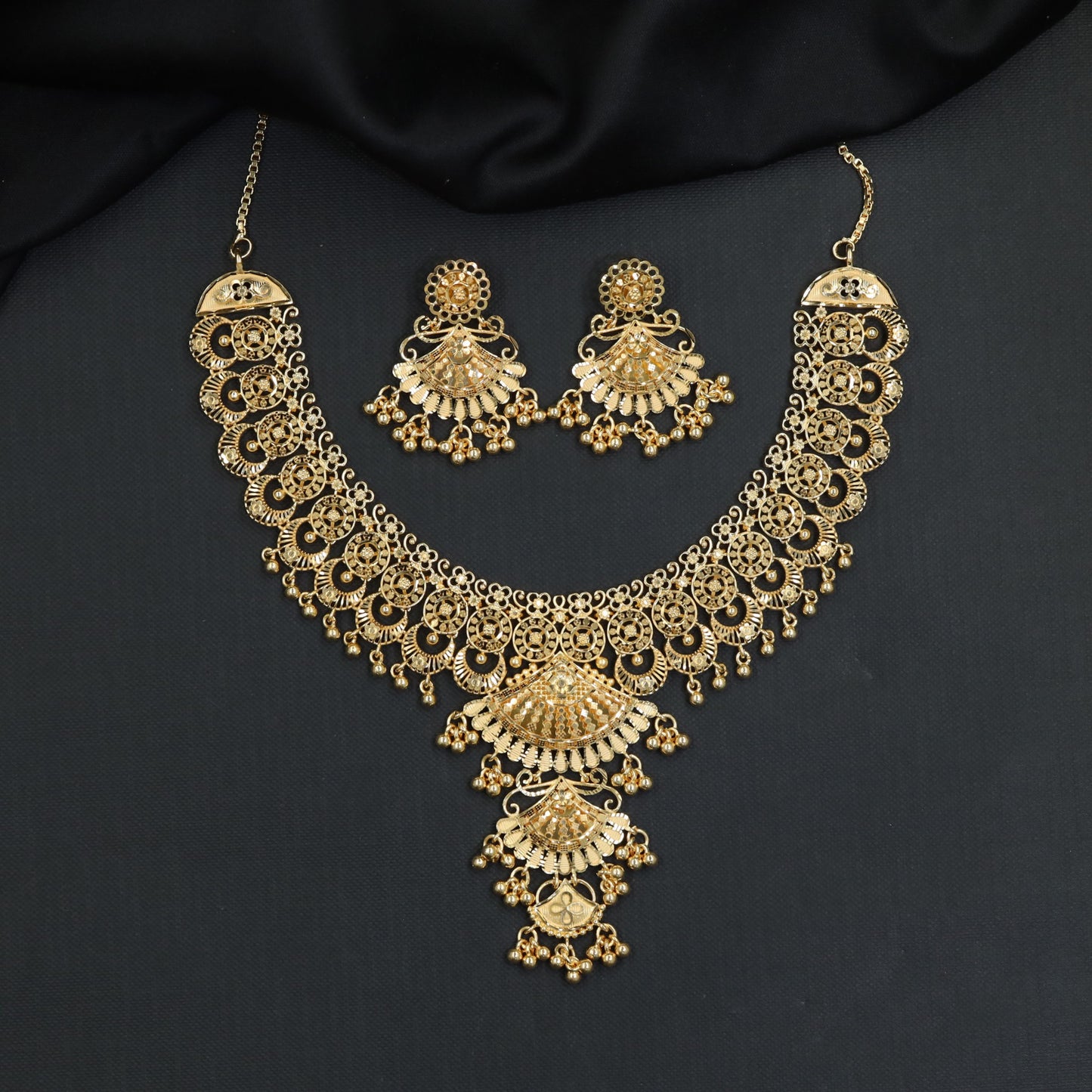 Intricate Openwork Forming Necklace with Cascading Centrepiece