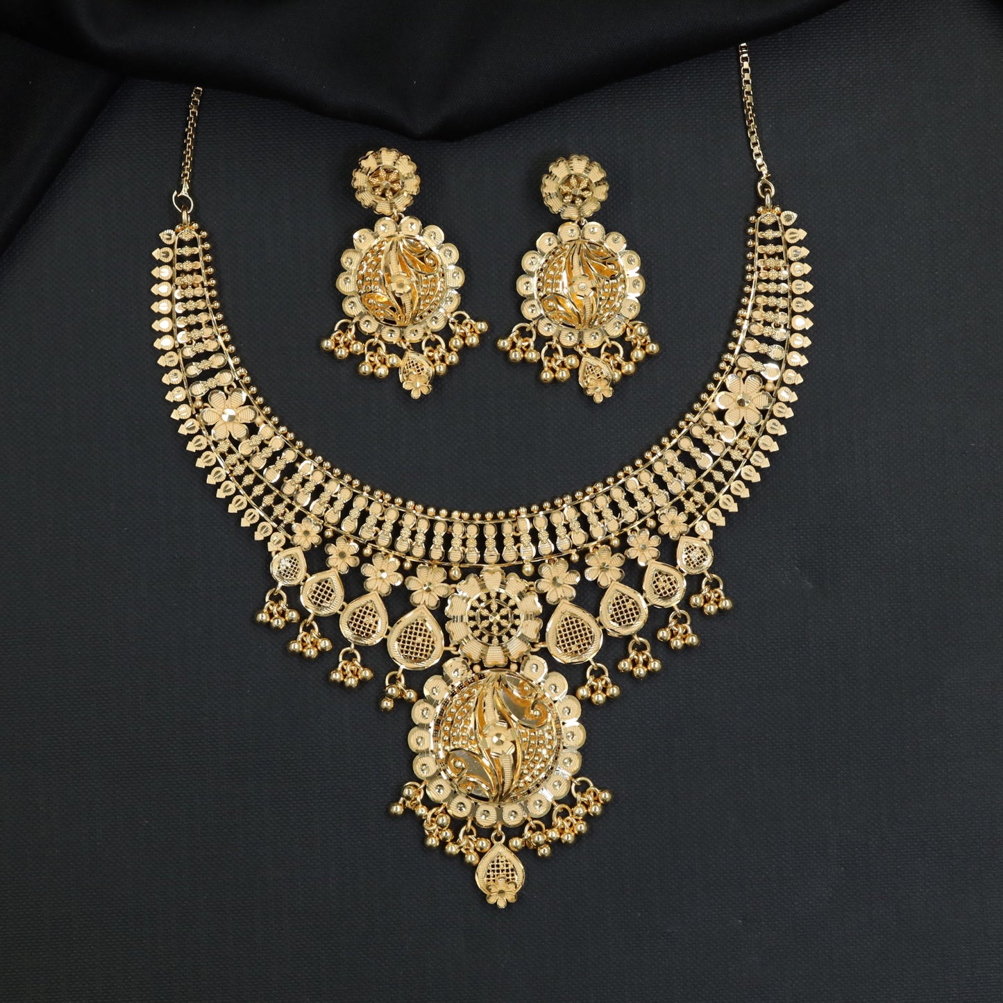 Floral Medallion Forming Necklace with Cascading Drop Details