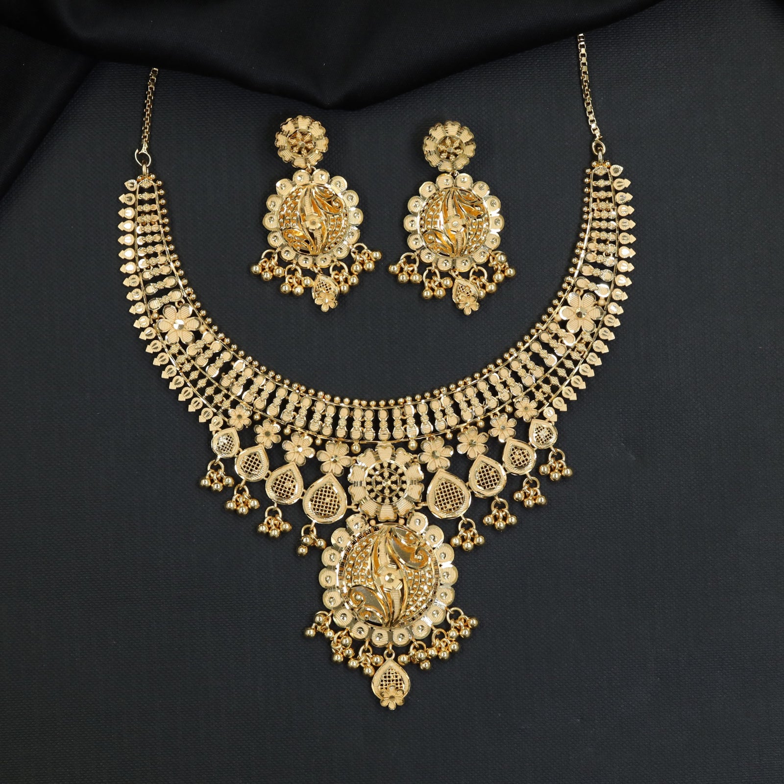 Floral Medallion Forming Necklace with Cascading Drop Details