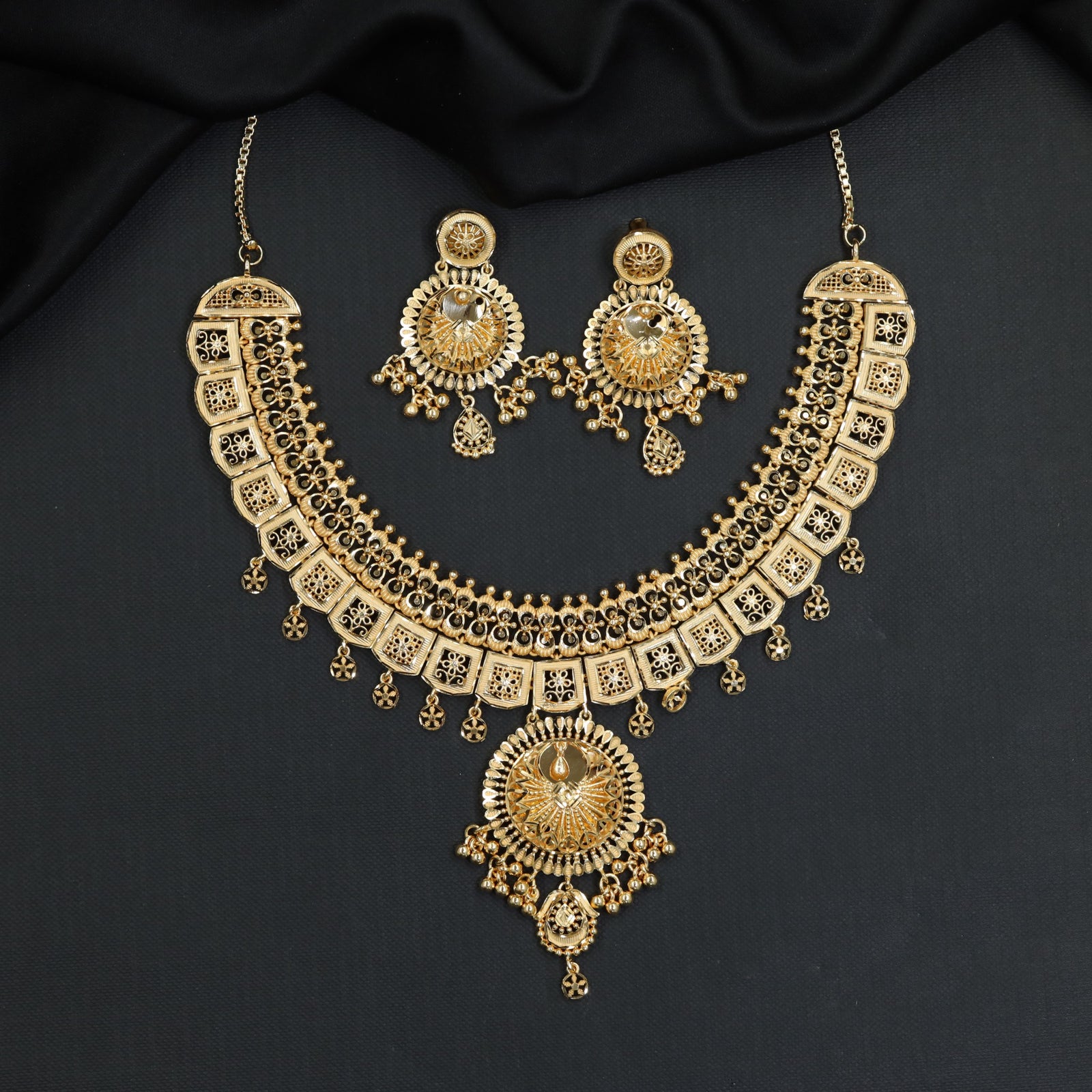Classic Panel Forming Necklace with Circular Medallion and Drops