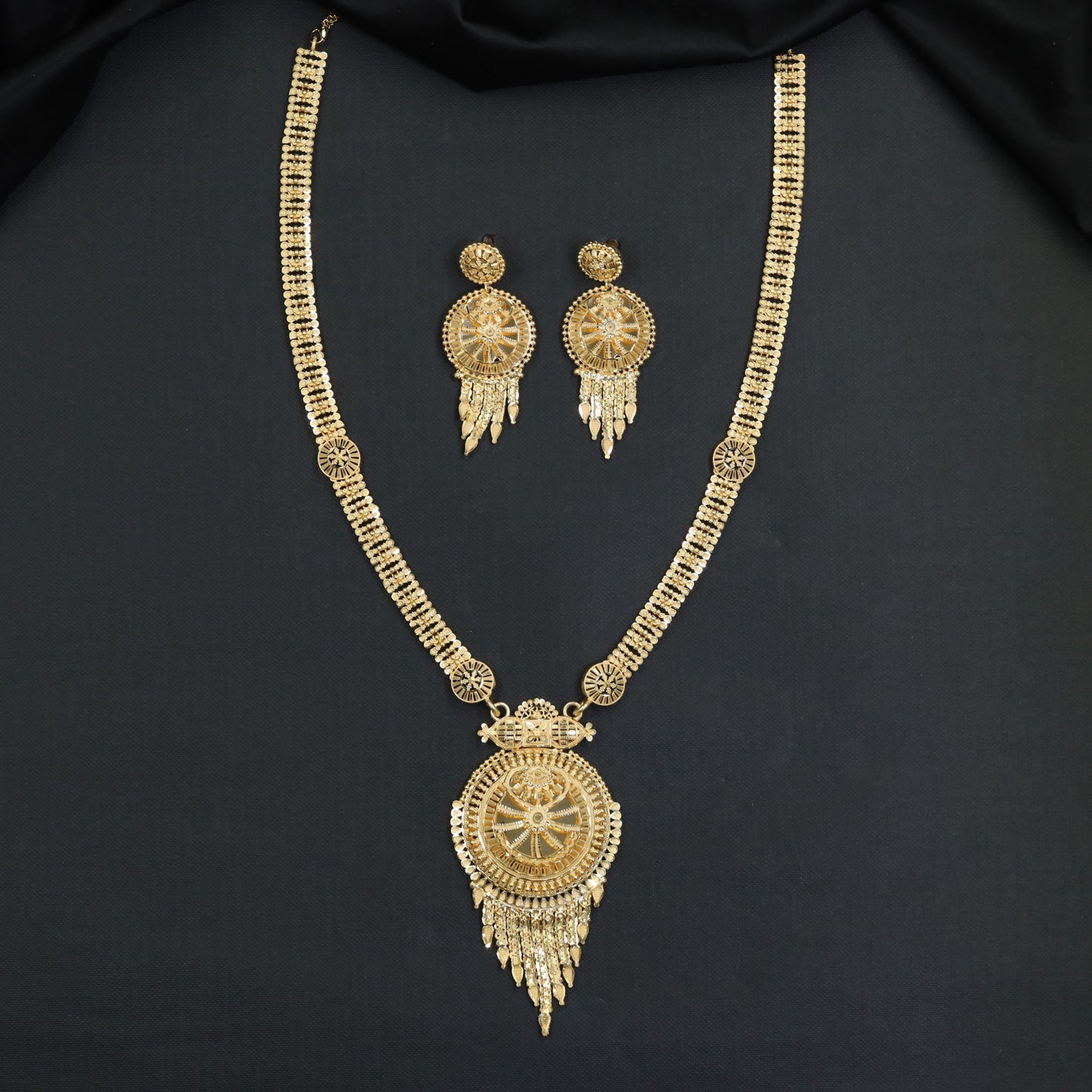 Sunburst Medallion Forming Long Haara with Pendant Fringe
