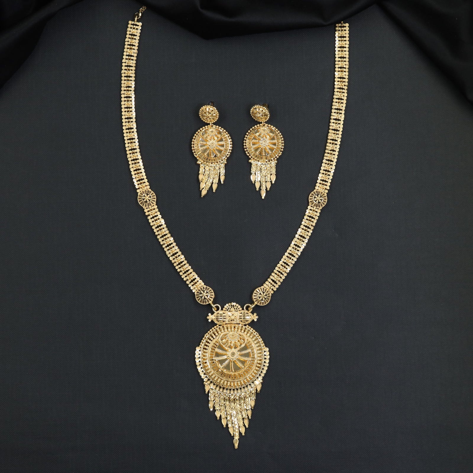 Sunburst Medallion Forming Long Haara with Pendant Fringe