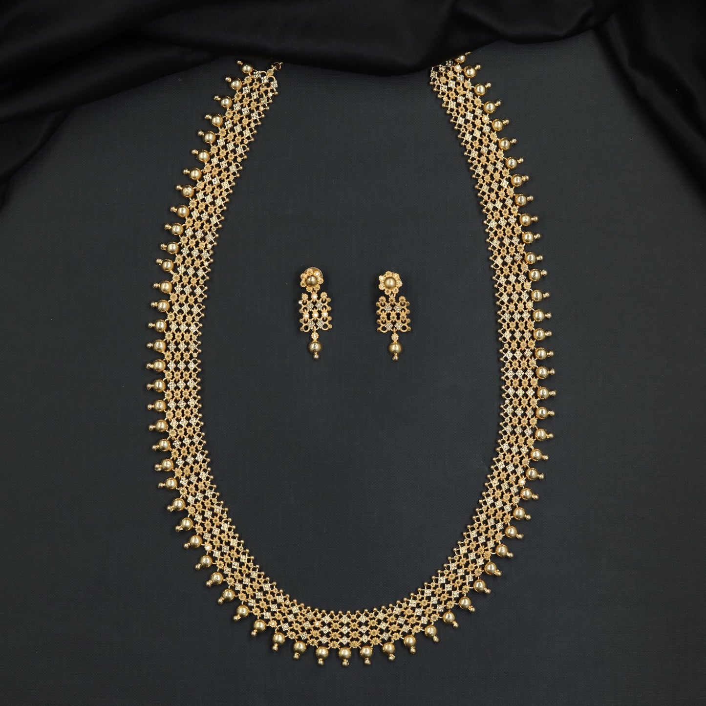 Intricate Lattice Forming Long Haara with Beaded Edging